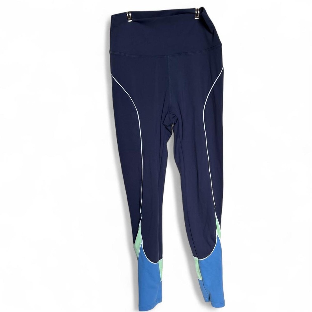 Wilo Navy blue leggings with white piping light blue & green panels size Medium